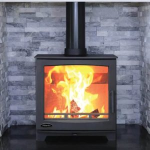 Atlantic Oyster 8kw Free Standing Stove sitting in a black slate tilled on a black straight edged shaped heart